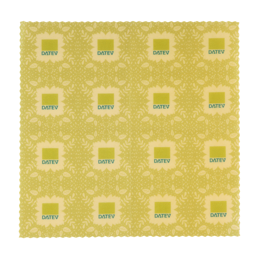 Gelb-grünes, gemustertes Pflanzenwachstuch  mit kleinen DATEV-Logo-Elementen